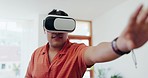 Virtual reality glasses, man and digital world in home for cyber fantasy, technology or video games. Guy, VR and iot gaming in living room for future innovation, ui system and multimedia in metaverse