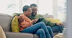 Couple, hug and digital tablet on sofa for streaming, subscription or internet search at home. Love, relax and black woman with man in living room online for social media, movie or entertainment 