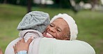 Happy, connection and senior friends hugging in a park for bonding on a walk for fresh air together. Smile, happiness and elderly women in retirement embracing for care, love or reunion at a garden.