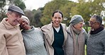 Laughing, face and a caregiver with people in nature for bonding, conversation and a joke. Happy, portrait and a nurse with senior or elderly friends with a hug in a garden for retirement together