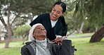 Nurse, garden and a senior woman in a wheelchair at the park, laughing together for freedom or a funny joke. Healthcare, medical or retirement with a carer and african patient walking out in a park