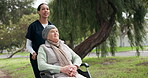 Nurse, wheelchair and elderly woman at park, nature or garden outdoor. Caregiver, person with a disability and walking for wellness, health and help in physical therapy, support and rehabilitation
