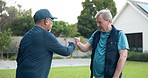 Senior men, fist bump and support of friends for fitness, walking or celebration of cardio exercise outdoor together in street. Mature, people and handshake for wellness, healthy workout or teamwork