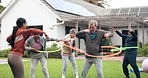 Class, physiotherapy and fun with old people and hoop for support, health and challenge. Wellness, rehabilitation and coaching with personal trainer in nursing home for energy, fitness and retirement