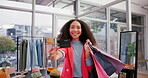 Woman with credit card, shopping bag and portrait in mall for fashion payment. Happy, plastic money and face of African customer with gift in retail sales, discount deal or finance in boutique store