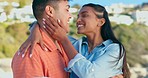 Beach, happy and couple spinning in nature on holiday, summer vacation and adventure together by sea. Travel, kiss and man carrying woman by ocean for bonding, playful relationship and relax outdoors