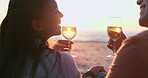 Sunset, beach and couple toast with wine for love, relax or celebrate anniversary from the back. Happy man, woman and cheers at sea with alcohol, champagne or drink for celebration, vacation or party