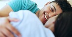 Love, relax and smile with couple in bedroom for massage, morning and bonding. Peace, wake up and care with Indian man and woman in bed at home for marriage, wellness and commitment together