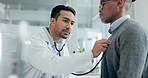 Doctor, man and listening with stethoscope to patient heartbeat, healthcare consultation and cardiology test in clinic. Asian medical worker check chest, lungs and breathing assessment in hospital 