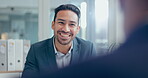 Meeting, interview or job opportunity with a business man in a human resources office for recruitment. Face, hiring and smile with a happy young employee talking to a colleague in the workplace