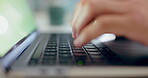 Business hands, keyboard and typing email on office desk working on article, research project, or proposal. Person, laptop and journalist with technology for internet, writing and information 