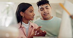 Laptop, internet and smile with a couple talking in the living room of their home together for planning. Computer, online shopping or ecommerce with a young man and woman chatting about a purchase