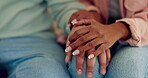 Couple, closeup and holding hands in home for love, care and support for help, empathy or gratitude. Man, woman or touch hand of partner for loyalty, commitment and trust of kindness, hope or forgive