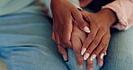 Couple, empathy and holding hands in home for support, care or love of gratitude together. Closeup of man, woman or touch hand of partner for loyalty, commitment or trust of kindness, hope or forgive