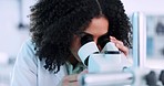 Scientist, woman and microscope in laboratory for research, DNA analysis and pharmaceutical development or medical study. Professional science person with biotechnology and lens check for particles