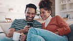 Couple, phone and laugh with coffee on sofa, meme and happy with chat, relax and web blog in home. Man, woman and excited with comic video on couch with matcha, tea cup or latte on social media app