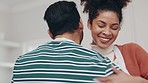 Music, happy and couple dance in the kitchen while cooking, bonding and having fun together. Smile, romance and young man and woman moving to song, playlist or radio and preparing dinner meal at home