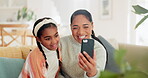 Video call, mother and girl with cellphone, communication and wave with smile in living room of apartment. Family, woman and child on mobile phone happy, internet and connection with technology 