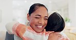 Care, happy and mom hugging her child in the living room of modern home in the morning. Smile, love and girl kid embracing her young mother from Colombia for greeting in the lounge of family house.