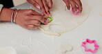 Cookies, shape and hands of mother and daughter in kitchen for breakfast, helping or learning. Food, love and support with closeup of people and cooking in family home for dessert, recipe or pastry