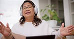 Dancing, headphones and mature woman singing and working on a laptop for work from home job. Technology, happy and Asian female person moving and listening to music, radio or playlist at her house.