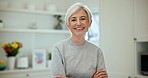 Crossed arms, smile and face of senior woman at a home with sweet, cute and positive personality. Happy, excited and portrait of elderly female person in retirement with confidence at modern house.