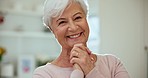 Happy, laughing and face of senior woman at a home with sweet, cute and positive personality. Smile, excited and portrait of elderly female person in retirement listening to funny comic joke at house