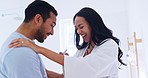 Smile, excited and couple with positive pregnancy test in the bathroom for celebration together. Happy, love and young man with support for pregnant woman with a fertility stick device in modern home