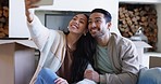 Happy couple, real estate and selfie in social media, property or investment moving in new home together. Man and woman or homeowners smile with boxes in photograph, picture or vlog on phone in house