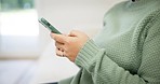 Woman, phone and hands typing in social media, communication or online networking at home. Closeup of female person or blogger in research, texting or chatting and browsing on mobile smartphone app