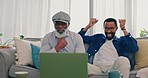 Senior father, team win and sport watching on laptop in a living room at home with app streaming online. Conversation, family and internet with bonding, web and game celebration of black people