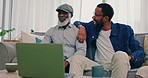 Senior father, man talk and watching on laptop in a living room at home with app streaming online. Conversation, family and internet with bonding, web subscription and computer of black people
