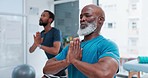 Black people, yoga and personal trainer in zen exercise, workout or meditation together at clinic. African yogi men in relax, healthcare or fitness for spiritual wellness, mindfulness or awareness