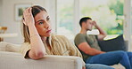 Couple, fight and stress of divorce on sofa for breakup, argument and thinking at home. Face of depressed woman frustrated with partner in conflict, crisis or drama of cheating with emotional anxiety