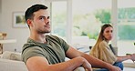 Couple, fight and thinking in home of divorce, breakup and ignore partner in bad argument on sofa. Sad man, angry woman and frustrated for stress, conflict or drama of cheating in toxic relationship