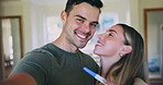 Selfie, home and couple with pregnancy test, excited and post with happiness, celebration and memory. Portrait, man and woman with results, profile picture and kiss with good news, pregnant and love