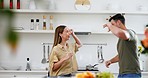 Energy, happy and couple dance in the kitchen to music, playlist or radio at modern apartment. Smile, love and young man and woman moving, bonding and moving to a song or album together at home.