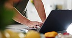 Home, closeup and man with a laptop, typing and connection with network, communication and blog. Person, hands and guy with a pc, email notification and search internet with website information