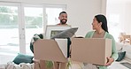 Happy couple, box and moving in new home together in finance, investment or relocation. Excited man and woman walking with boxes in property, building or house for mortgage loan, start or renovation