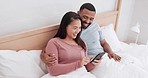 Bedroom, phone and couple laughing, relax and reading funny mobile app, meme joke or relationship humour story. Smartphone, home bed and Japanese woman, man or diversity people streaming comedy video