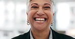Senior woman, ceo closeup and laughing face in a office with consultant manager confidence. Funny, comedy and happy professional employee at a company with job at consultation agency with a smile