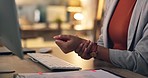 Business woman, hands and wrist pain in office at computer from osteoporosis, orthopedic joint and working late. Closeup of employee with carpal tunnel injury, fibromyalgia and muscle fatigue at desk