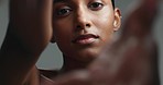 Face, beauty and skincare with a woman in studio on a gray background for love, cosmetics or self care. Portrait, makeup and aesthetic with a young model closeup for luxury treatment or wellness