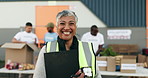 Happy senior woman, manager and NGO in charity, volunteer or community service in teamwork. Portrait of mature female person or organizer smile in happiness for leadership, donations or contribution