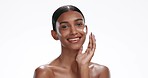 Face of Indian woman with cream for skincare, beauty and facial cosmetics on white background. Dermatology, wellness and portrait of person with moisturizer, lotion and anti aging creme in studio