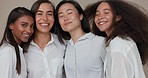 Women, face and hair for beauty, group diversity and love or support in friends portrait, wind and brown, studio background. Young people smile together and hug for inclusion, natural growth and care