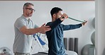 Physical therapy, stretching and patient training muscle with resistance band, equipment and support from therapist, Strong, arms and man in physiotherapy exercise with doctor and person in clinic
