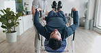 Inversion, table and man in therapy for back pain, healing and stretching spinal muscle with chiropractor in healthcare clinic. Physiotherapy, rehabilitation and patient stretch in spine with doctor