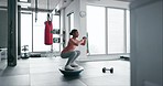 Woman, fitness or squat on bosu ball for exercise, workout or training in gym for balance or wellness. Energy, power or healthy sports girl athlete with exercising equipment for strong legs or core