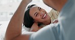 Couple, laughing and relax on bed with love, bonding and happy people together at home. Funny, trust and support of man and woman partner for healthy marriage, conversation and communication
